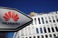 The logo of Huawei Technologies is pictured in front of the German headquarters of the Chinese telecommunications giant in Duesseldorf