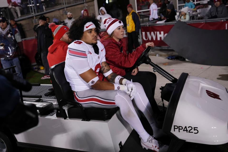 Oct 28, 2023; Madison, Wisconsin, USA; Ohio State Buckeyes safety Lathan Ransom (8) is carted off the field during the second half of the NCAA football game against the Wisconsin Badgers at Camp Randall Stadium. Ohio State won 24-10.