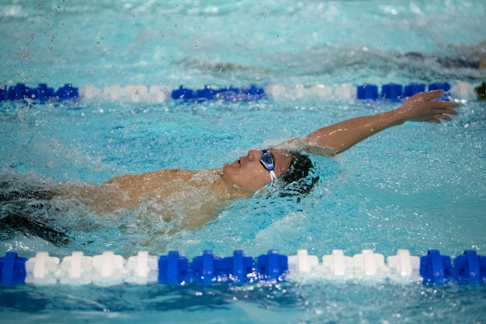 Pueblo County's Otis Shin competes in the 100-yard beckstroke event during a dual at Pueblo Central on Tuesday, April 12, 2022.