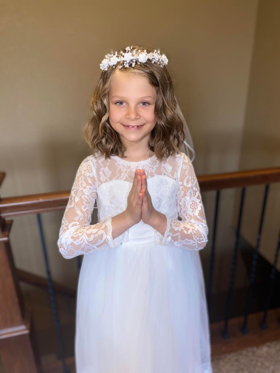 Brynley Heidebrink, 7, went viral on social media after drinking some wine during her first communion in Brandon on April 23, 2022.