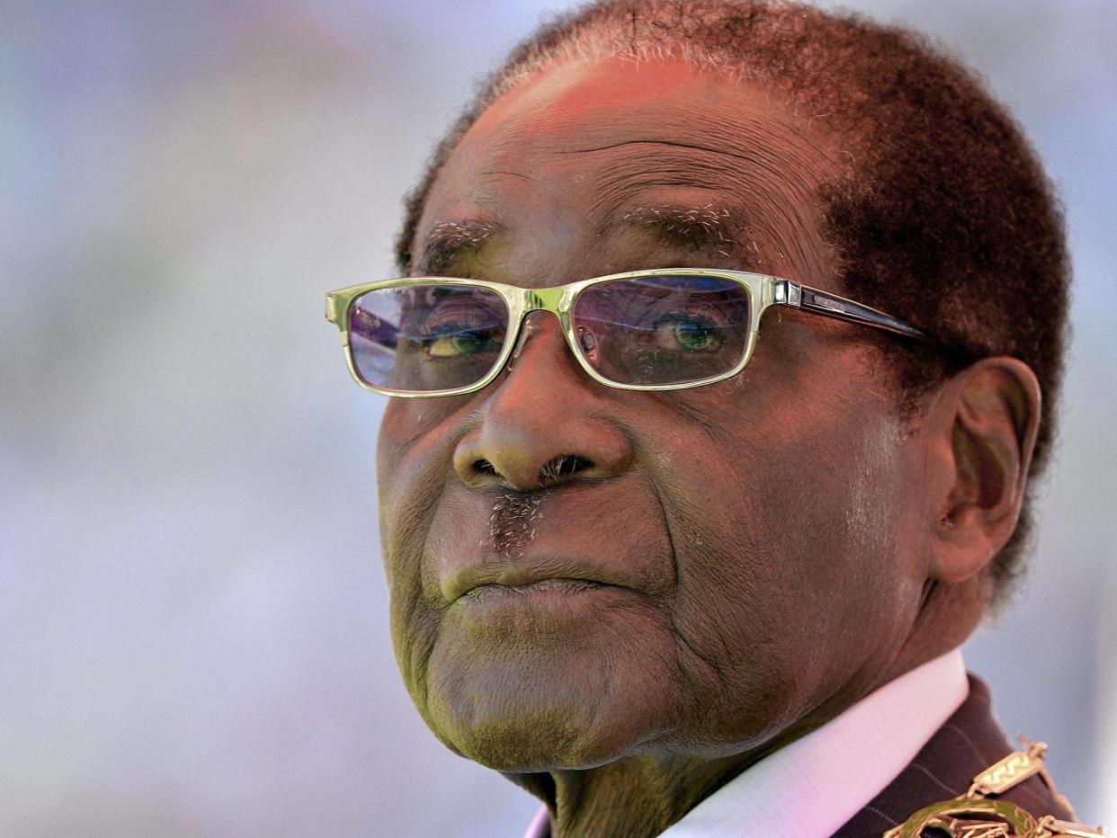 It comes after his wife said the Mr Mugabe could contest the election even if he is 'a corpse': AFP/Getty