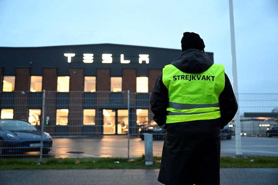 Emma Hansson, chairman of IF Metall Stockholms län stands in front of the electric car company Tesla's Service Center in Segeltorp, south of Stockholm, as workers strike for the signing of a collective agreement on October 27, 2023