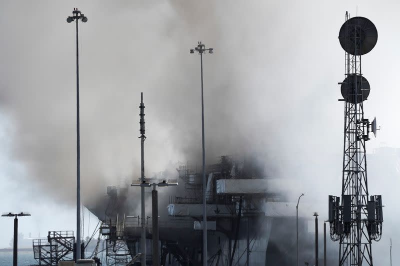 Smoke rises from a fire on board the U.S. Navy amphibious assault ship USS Bonhomme Richard