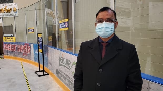 Dr. Wajid Ahmed, medical officer of health for Windsor-Essex, at the Libro Credit Union Centre vaccine clinic on March 29, 2021. Ahmed said Wednesday that the region is ready to see looser COVID-19 restrictions. (Tahmina Aziz/CBC - image credit)