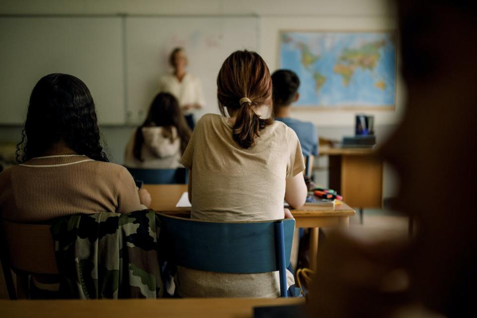 Some educators across the U.S. worry about the backlash from teaching about racial discrimination. <a href="https://www.gettyimages.com/detail/photo/rear-view-of-teenage-girls-and-boys-learning-in-royalty-free-image/1345022793?phrase=classrooms&adppopup=true" rel="nofollow noopener" target="_blank" data-ylk="slk:Maskot via Getty Images;elm:context_link;itc:0;sec:content-canvas" class="link ">Maskot via Getty Images</a>