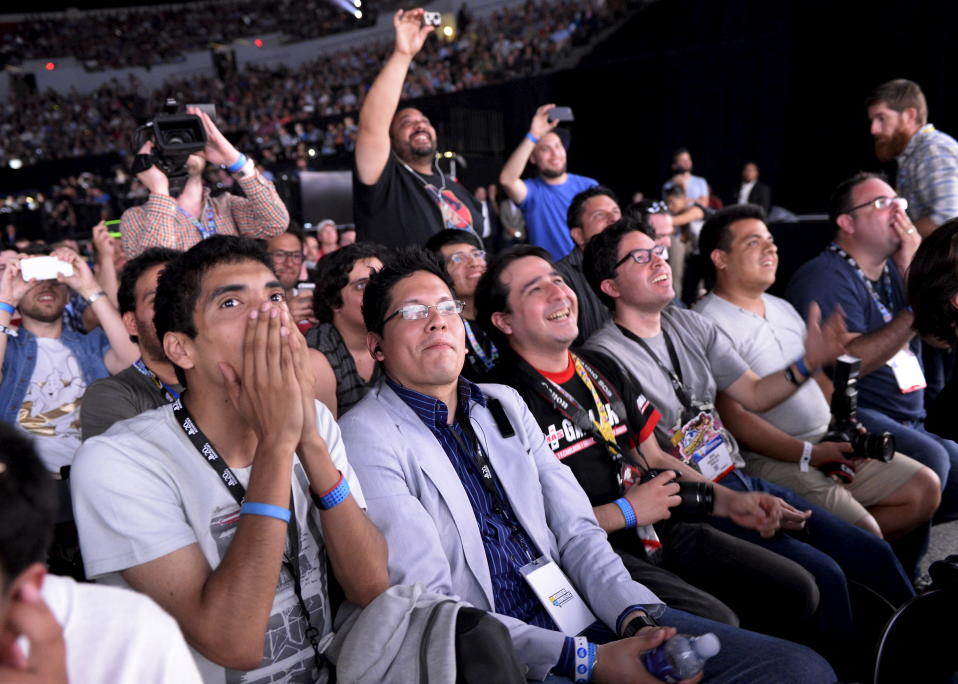 Attendees react during a video game presentation at the Sony Playstation E3 conference in Los Angeles, California June 15, 2015. REUTERS/Kevork Djansezian