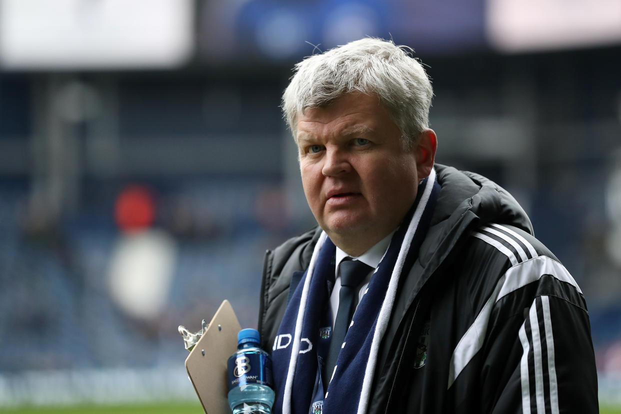 WEST BROMWICH, ENGLAND - FEBRUARY 03: Adrian Chiles arrives pitch side for the start of the Cyrille Regis Tributes during the Premier League match between West Bromwich Albion and Southampton at The Hawthorns on February 3, 2018 in West Bromwich, England. (Photo by Adam Fradgley - AMA/West Bromwich Albion FC via Getty Images)