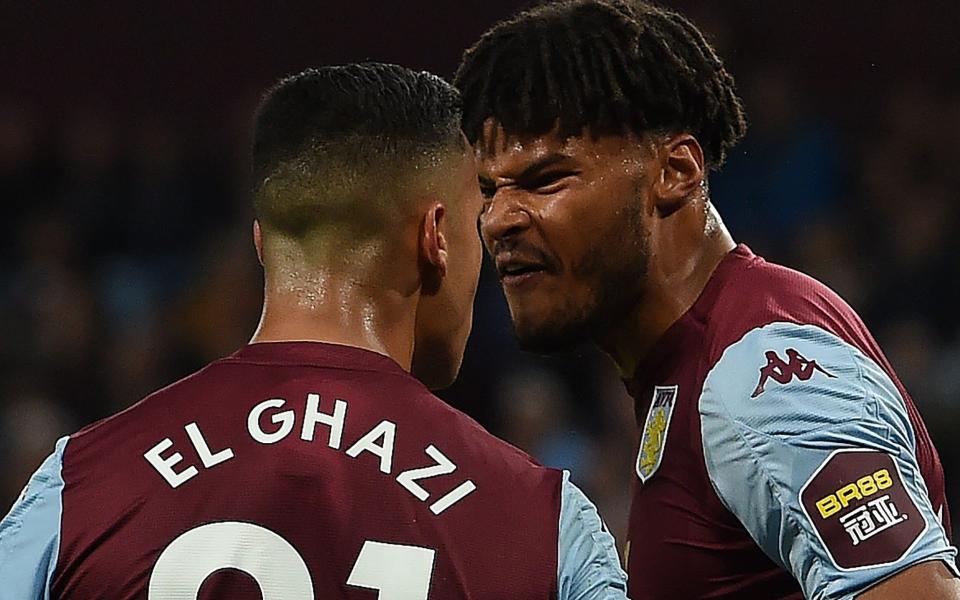 Aston Villa team-mates Anwar El Ghazi and Tyrone Mings clash  - AFP