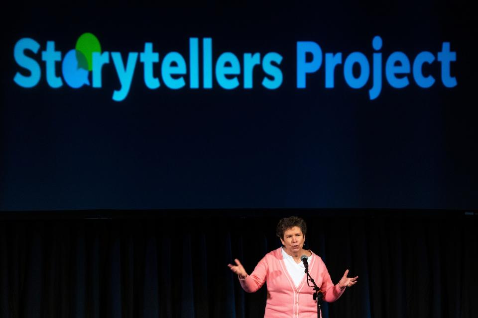 Susan Sims tells a story during the Des Moines Storytellers Project's "Travel" show at Hoyt Sherman Place on Tuesday, June 20, 2023, in Des Moines.