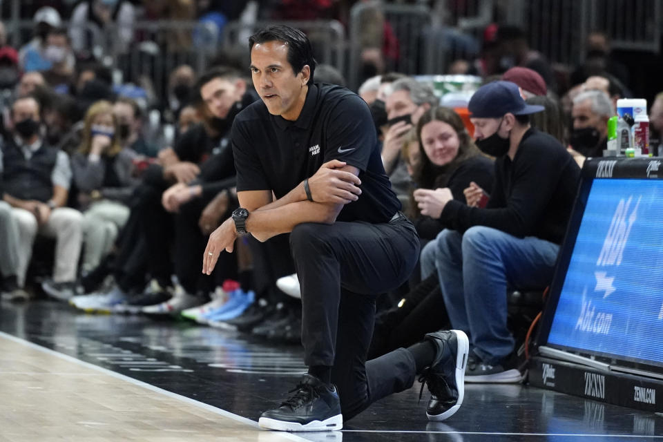 Miami Heat coach Erik Spoelstra watches the team during the first half of an NBA basketball game against the Chicago Bulls in Chicago, Saturday, Nov. 27, 2021. (AP Photo/Nam Y. Huh)