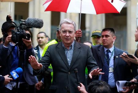 Colombia's former President Alvaro Uribe gestures after casting his vote for the referendum at Bolivar Square in Bogota, Colombia. REUTERS/John Vizcaino