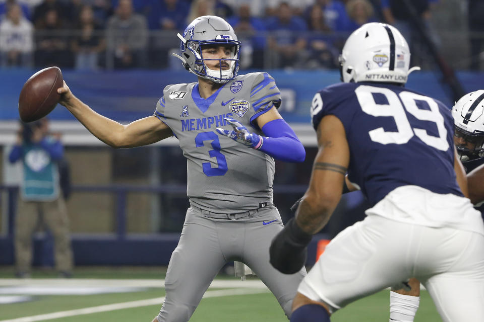 Memphis quarterback Brady White (3) looks to throw as Penn State defensive end Yetur Gross-Matos (99) closes in during the first half of the NCAA Cotton Bowl college football game, Saturday, Dec. 28, 2019, in Arlington, Texas. (AP Photo/Ron Jenkins)