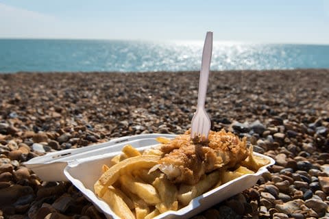 Brighton beach: a still life of pebbles, fish and chips - Credit: ©pitr134 - stock.adobe.com/Peter Kollar