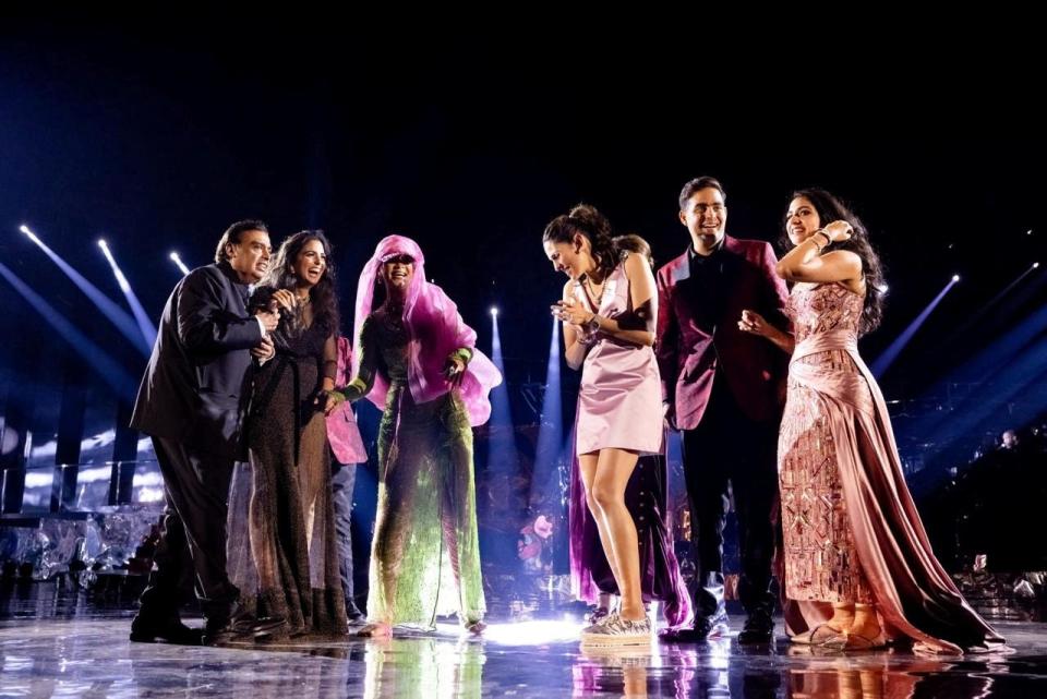 The Ambani family onstage with Rihanna.