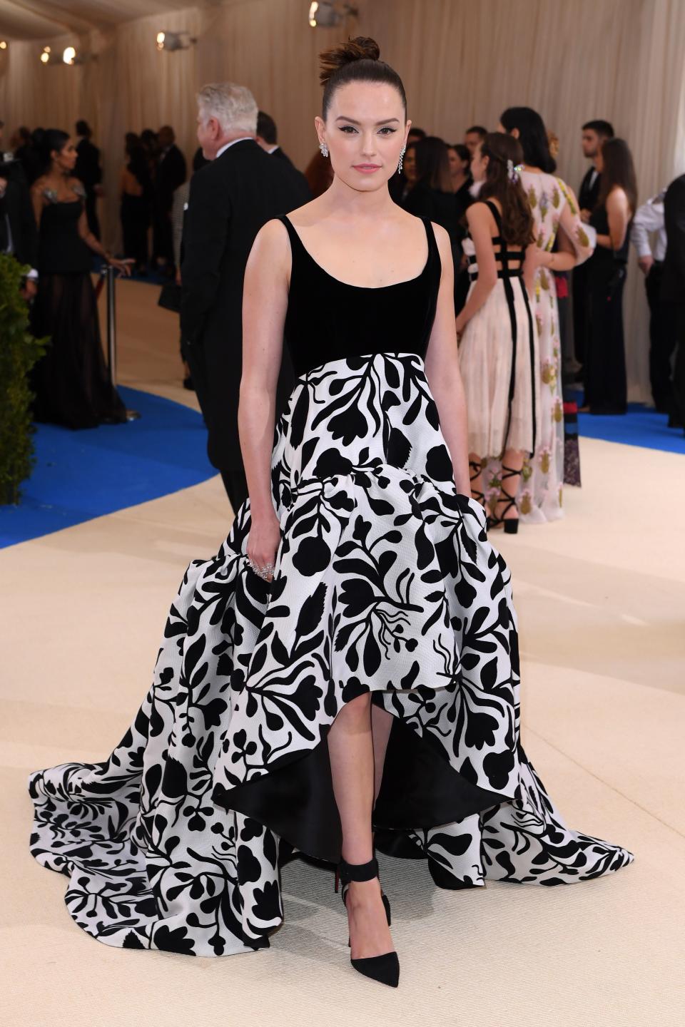 <h1 class="title">Daisy Ridley in Oscar de la Renta and Christian Louboutin shoes</h1><cite class="credit">Photo: Shutterstock</cite>