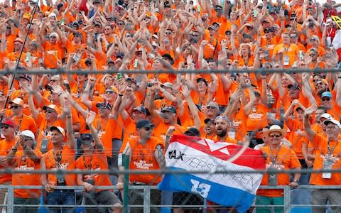 Fans of Red Bull driver Max Verstappen cheer prior to the start of the Hungarian Formula One Grand Prix at the Hungaroring racetrack in Mogyorod, northeast of Budapest, Hungary, Sunday, Aug. 4, 2019 - Credit: Laszlo Balogh