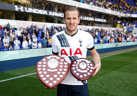 Tottenham's Harry Kane poses with trophies after the game Action Images via Reuters / Andrew Couldridge Livepic