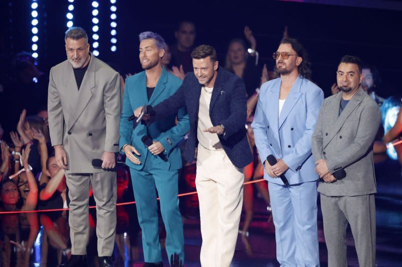 Justin Timberlake (C) and 'N Sync attend the MTV Video Music Awards in September. File Photo by John Angelillo/UPI