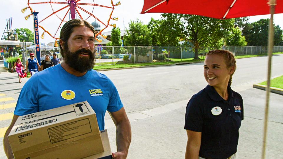 Dippin' Dots CEO Scott Fischer (left) will be featured in an "Undercover Boss" episode on Wednesday, Jan. 22, 2020, at Kentucky Kingdom in Louisville, where his company's frozen treats are popular with visitors. Fischer was trained and supervised by Bailey Richardson (right), Kentucky Kingdom's food and beverage supervisor.