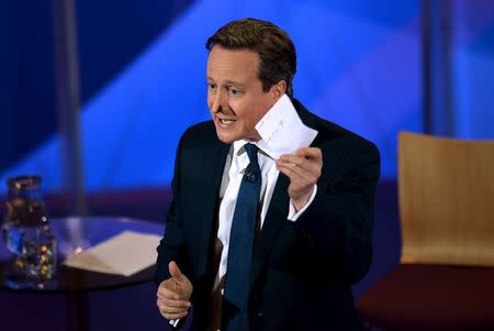 Prime Minister David Cameron takes part in a special BBC Question Time programme with the three main party leaders appearing separately at Leeds Town Hall, West Yorkshire, during the General Election 2015 campaign. Thursday April 30, 2015. REUTERS/Stefan Rousseau/PA Wire/Pool