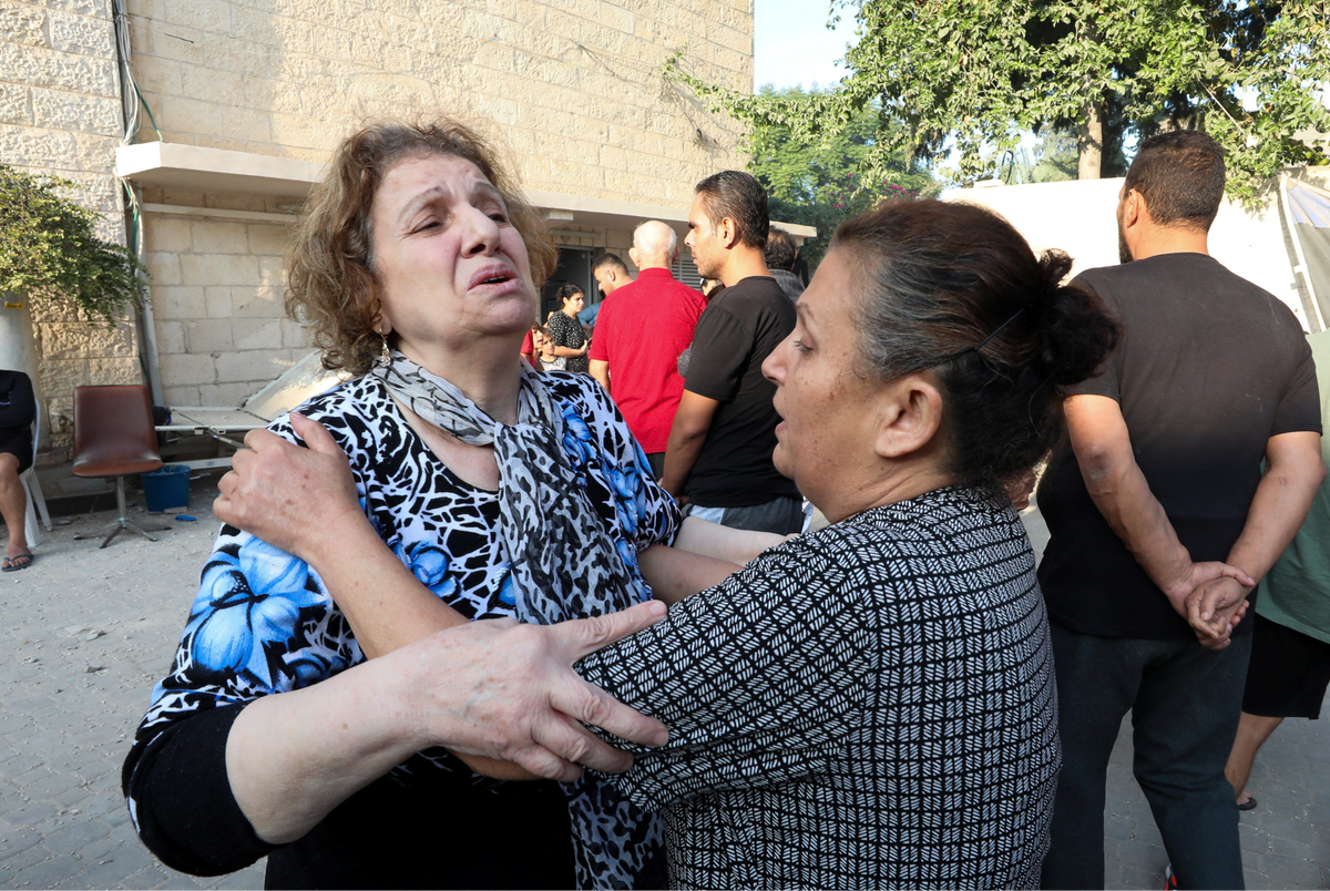 Woman reacts at the Greek Orthodox Saint Porphyrius Church which was damaged by an Israeli strike (REUTERS)