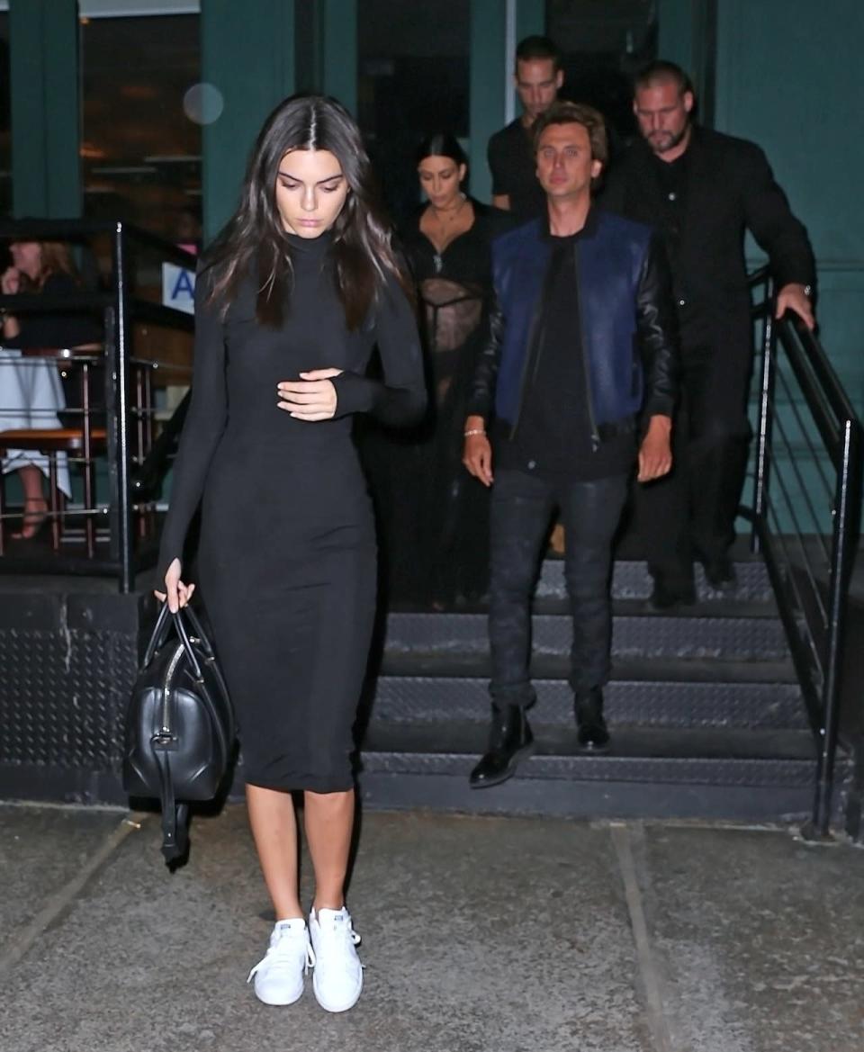 <p>If this look doesn’t scream New Yorker, we don’t know what does. Jenner looked casual-cool in a black bodycon dress, fresh white sneakers, and a Givenchy purse. </p>