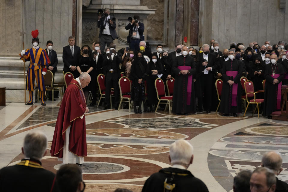 Pope Francis arrives to celebrate the 'In passione Domini' (in the passion of the Lord) mass in St. Peter's Basilica at the Vatican on Good Friday, Friday, April 15, 2022. (AP Photo/Andrew Medichini)