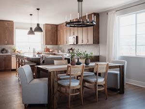 A Mediterranean-inspired kitchen in a Heatherly at Rancho Mission Viejo model home features one of the Bobby Berk x Tri Pointe Homes collections