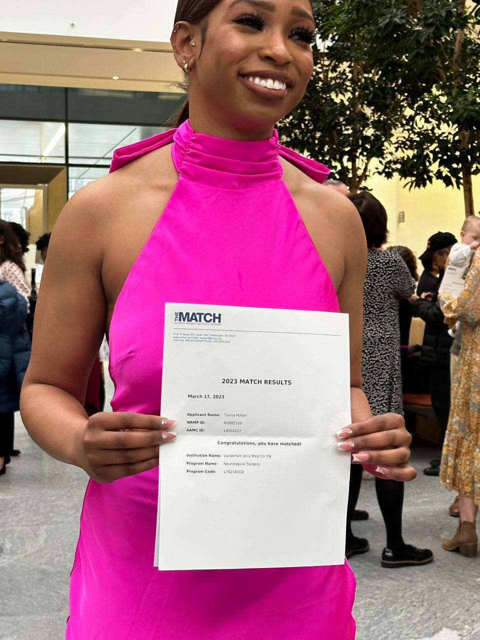 FAMU alumna Tamia Potter, a current student at Case Western Reserve University's School of Medicine, holds up her medical residency match results on March 17, 2023.