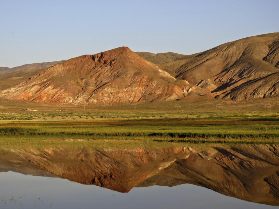 FILE - The Dixie Meadows is pictured in June 2017 in Churchill County, Nev. In a lawsuit filed Dec. 15, 2021, conservationists and tribal leaders are suing the U.S. government to try to block construction of two geothermal plants there that they say will destroy a sacred hot springs and push the toad to the brink of extinction. A federal judge said on Tuesday, Jan. 4, 2022, he intends to temporarily block any construction work for 90 days at a proposed geothermal power plant in Nevada that opponents say would destroy a sacred tribal site and could result in extinction of a rare toad being considered for endangered species protection.(Patrick Donnelly/Center for Biological Diversity via AP, File)