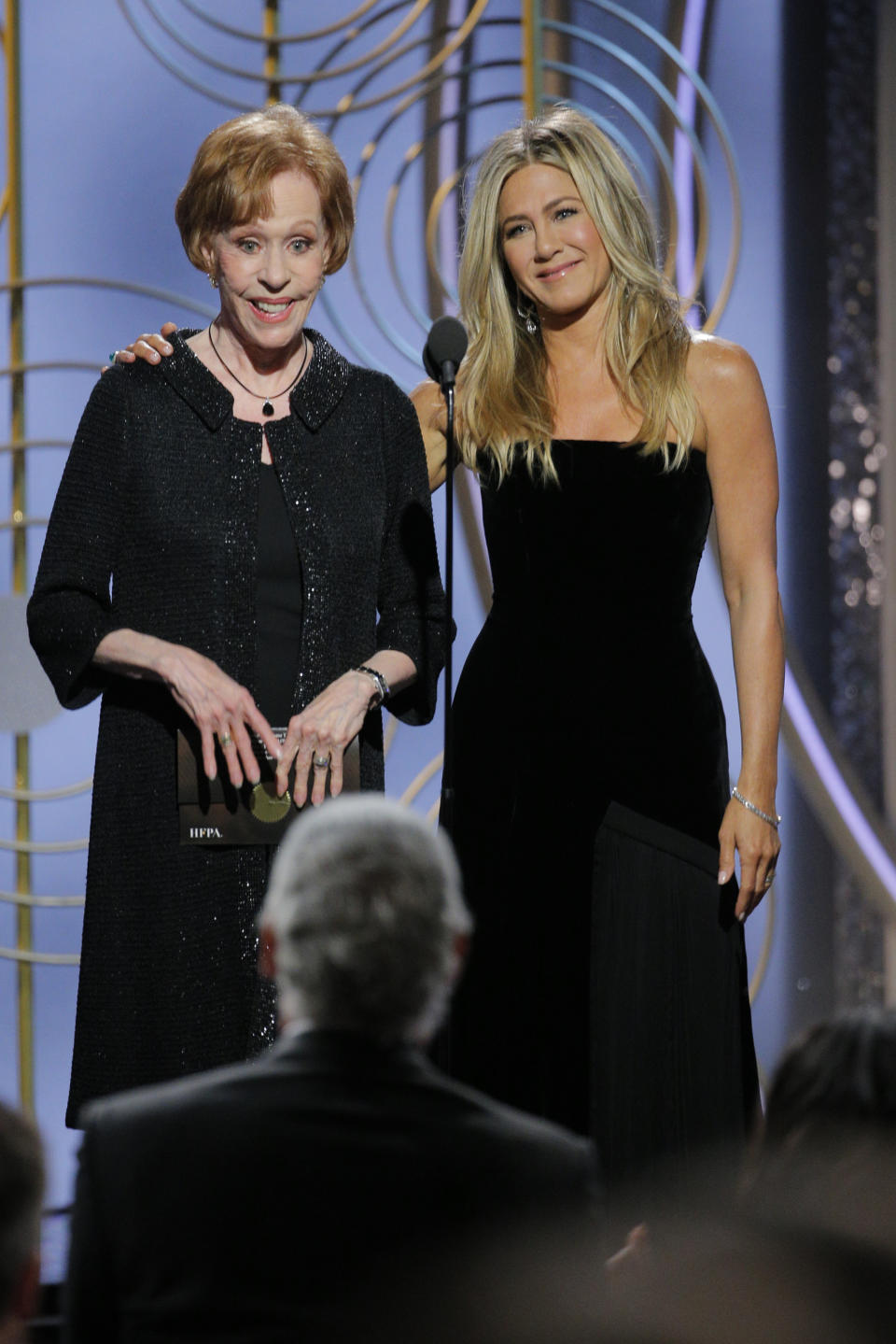 Presenters Carol Burnett and Jennifer Aniston onstage during the Golden Globe Awards in January 2018. (Photo: Paul Drinkwater/NBCUniversal via Getty Images)