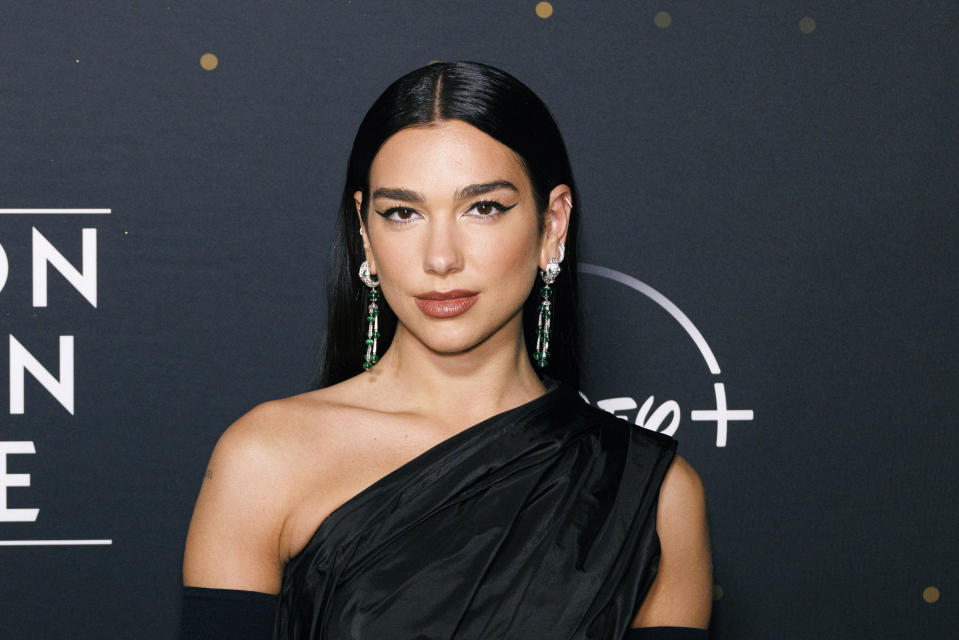 Dua Lipa arrives at Elton John's final North American show of his "Farewell Yellow Brick Road" tour on Sunday, Nov. 20, 2022, at the Dodger Stadium in Los Angeles. (Photo by Willy Sanjuan/Invision/AP)