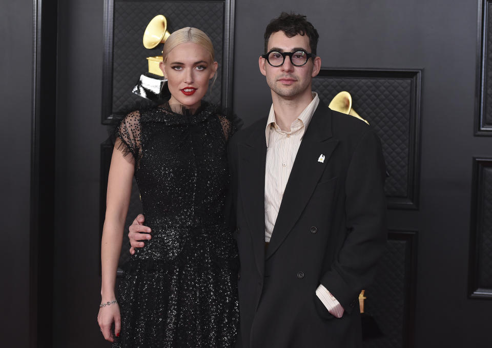 Carlotta Kohl, left, and Jack Antonoff pose in the press room at the 63rd annual Grammy Awards at the Los Angeles Convention Center on Sunday, March 14, 2021. (Photo by Jordan Strauss/Invision/AP)