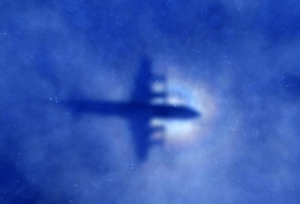 File photo of the shadow of a Royal New Zealand Air Force (RNZAF) P3 Orion maritime search aircraft on low-level clouds as it flies over the southern Indian Ocean looking for missing Malaysian Airlines flight MH370