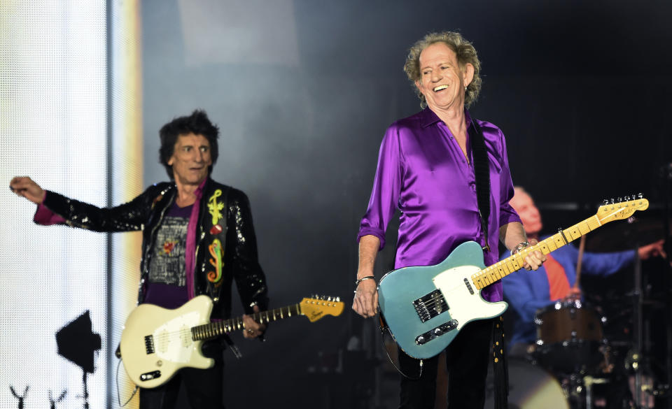 Ron Wood, left, and Keith Richards of the Rolling Stones perform during their concert at the Rose Bowl, Thursday, Aug. 22, 2019, in Pasadena, Calif. (Photo by Chris Pizzello/Invision/AP)