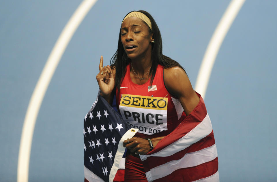 United States' Chanelle Price celebrates winning the gold medal in the women's 800m final during the Athletics Indoor World Championships in Sopot, Poland, Sunday, March 9, 2014. (AP Photo/Alik Keplicz)