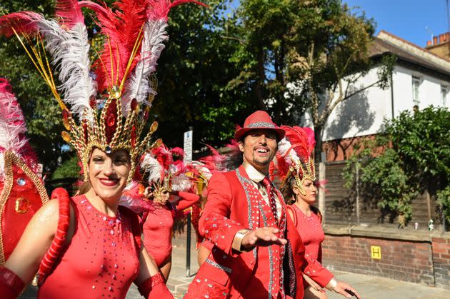 Passista dancers for the Paraiso School of Samba make their way to the Carnival parade. (Photo: Clara Watt for HuffPost)