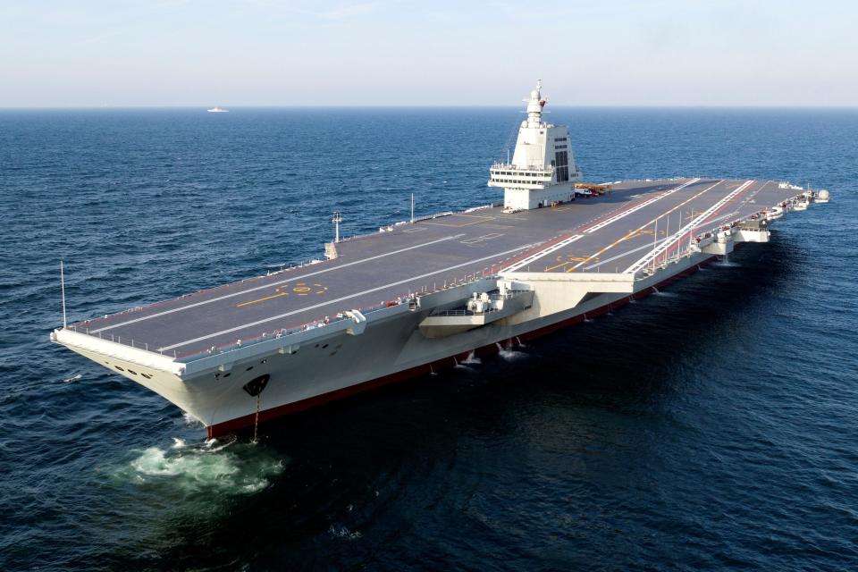 An aerial photo taken on May 1 by a drone shows China's third aircraft carrier, the Fujian, during its first sea trials.