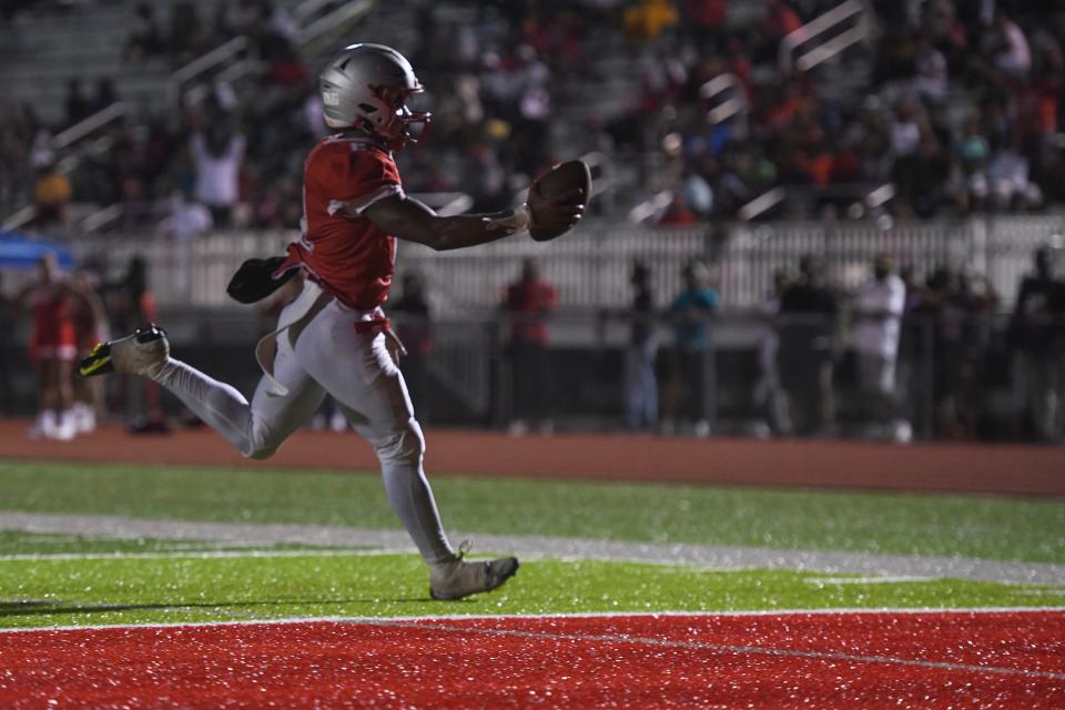 Laney wide receiver CJ Holmes (2) scores a touchdown at the Laney and Hephzibah high school football game at Laney High School on Friday, Aug. 25, 2023. Laney defeated Hephzibah 16-13.
