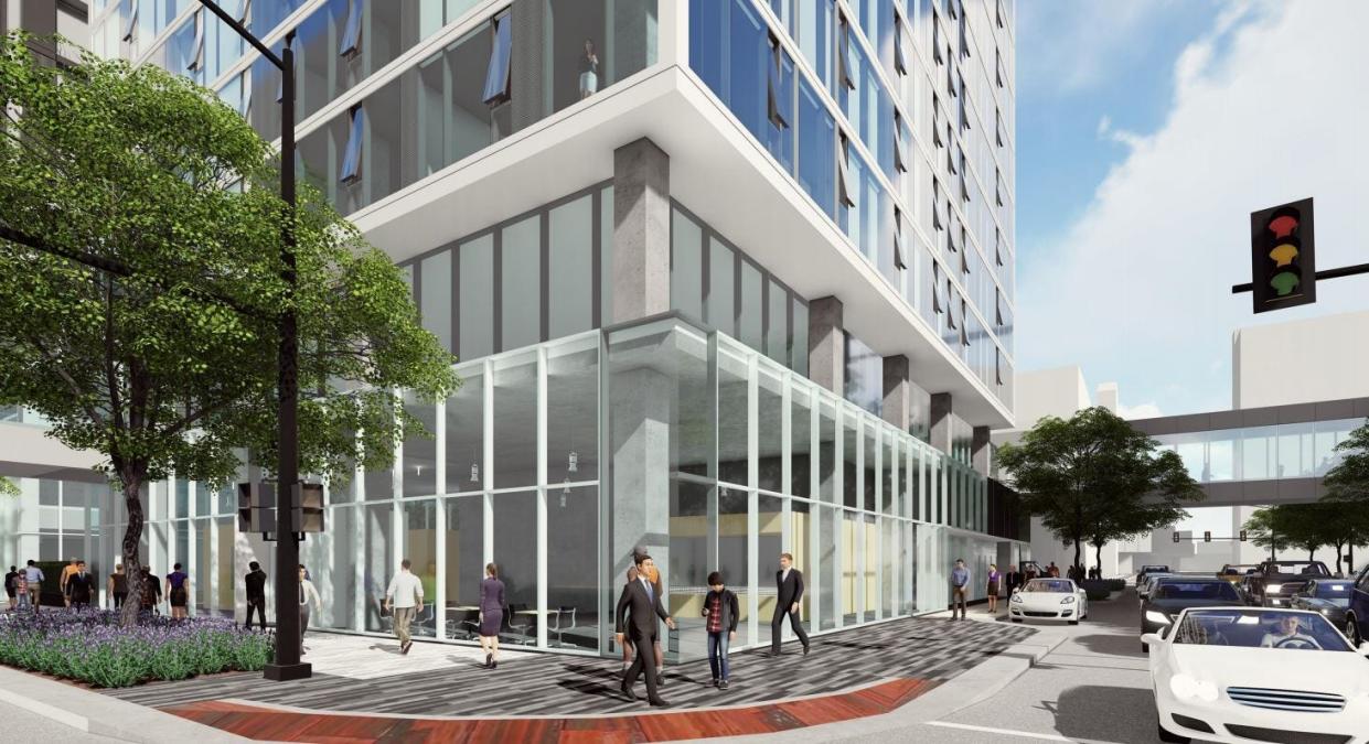 A street-level rendering of the tower planned for 515 Walnut St.