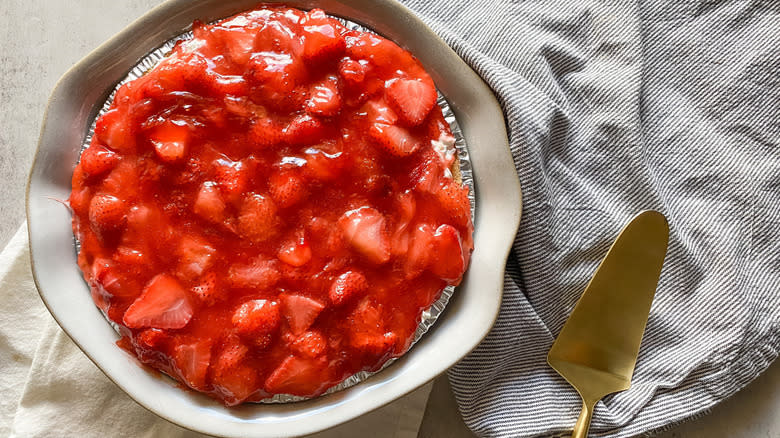 strawberry pie with serving spatula