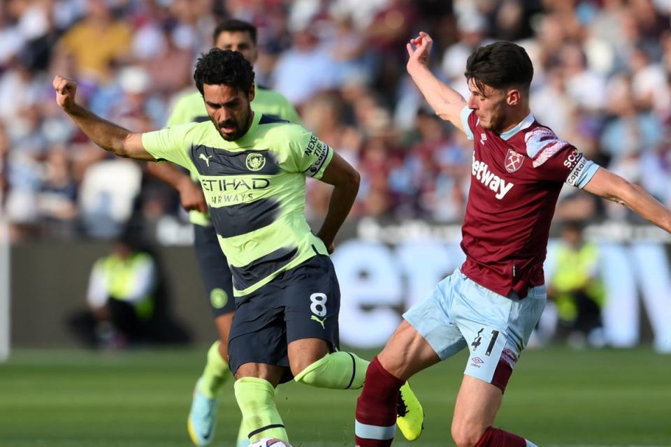 Double trouble: Arsenal want to sign both Ilkay Gundogan and Declan Rice this summer (Getty Images)