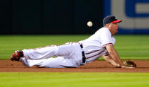 ATLANTA, GA - APRIL 17: Chipper Jones #10 of the Atlanta Braves dives for a ground ball by Daniel Murphy #28 of the New York Mets in the sixth inning at Turner Field on April 17, 2012 in Atlanta, Georgia. (Photo by Kevin C. Cox/Getty Images)