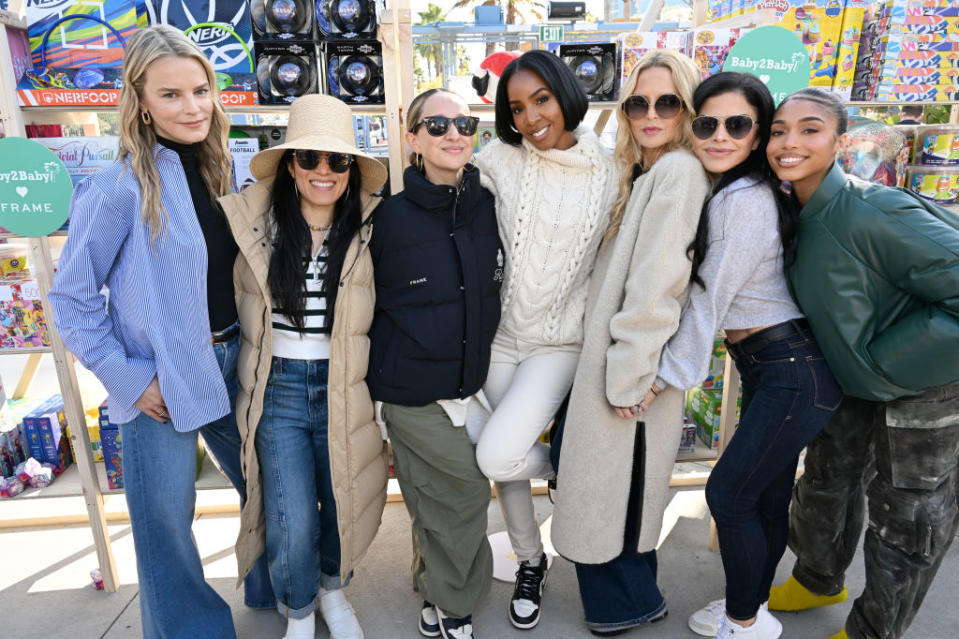 LOS ANGELES, CALIFORNIA - DECEMBER 14: (L-R) Baby2Baby Co-CEO Kelly Sawyer Patricof, Ali Wong, Jennifer Meyer, Kelly Rowland, Rachel Zoe, Lauren Sánchez, and Lori Harvey attend The Baby2Baby Holiday Distribution presented by FRAME and Nordstrom at Dodger Stadium on December 14, 2022 in Los Angeles, California. (Photo by Michael Kovac/Getty Images for Baby2Baby)