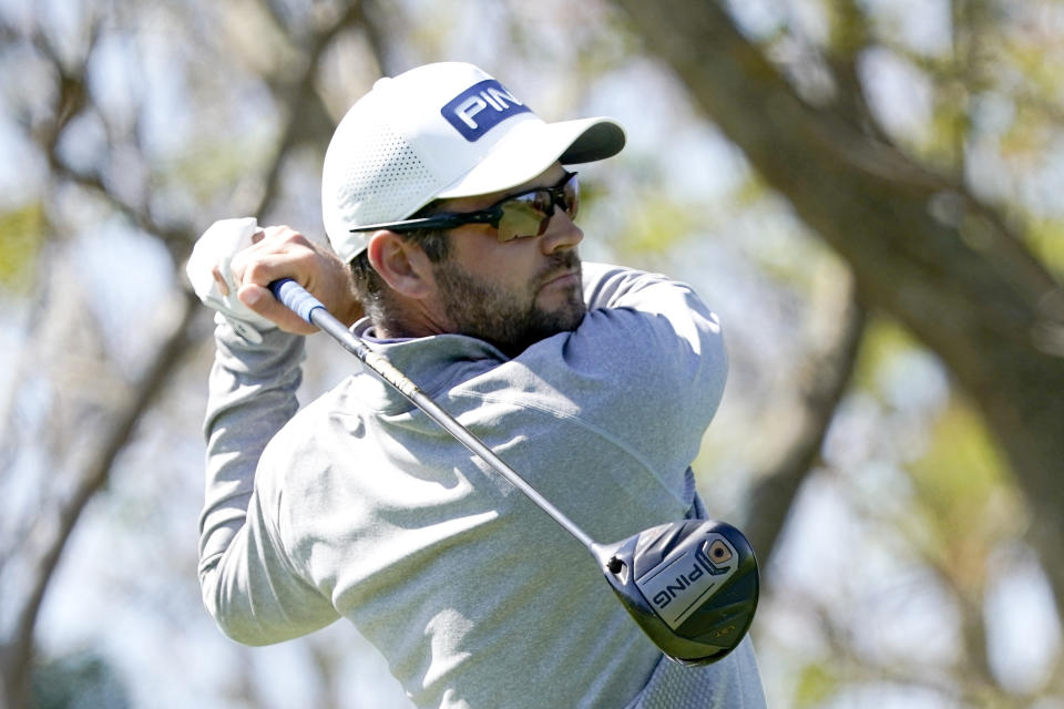 Corey Conners hits a shot from the third tee during the final round of the Arnold Palmer Invitational golf tournament Sunday, March 7, 2021, in Orlando, Fla. (AP Photo/John Raoux)