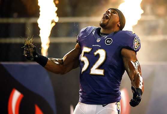 In this Sept. 23, 2012, file photo, Baltimore Ravens linebacker Ray Lewis reacts as he is introduced before an NFL football game against the New England Patriots in Baltimore. Ravens fans will rock the building during Ray Lewis\' pregame Squirrel Dance, a YouTube sensation that Lewis will perform for the final time before retiring. Will there be smoke and flames to accompany the star linebacker\'s ritual? (AP Photo/Nick Wass, File)