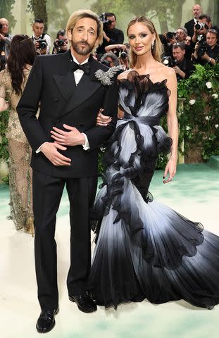 <p>Jamie McCarthy/Getty</p> Adrien Brody and Georgina Chapman attend the 2024 Met Gala in New York City on May 06, 2024