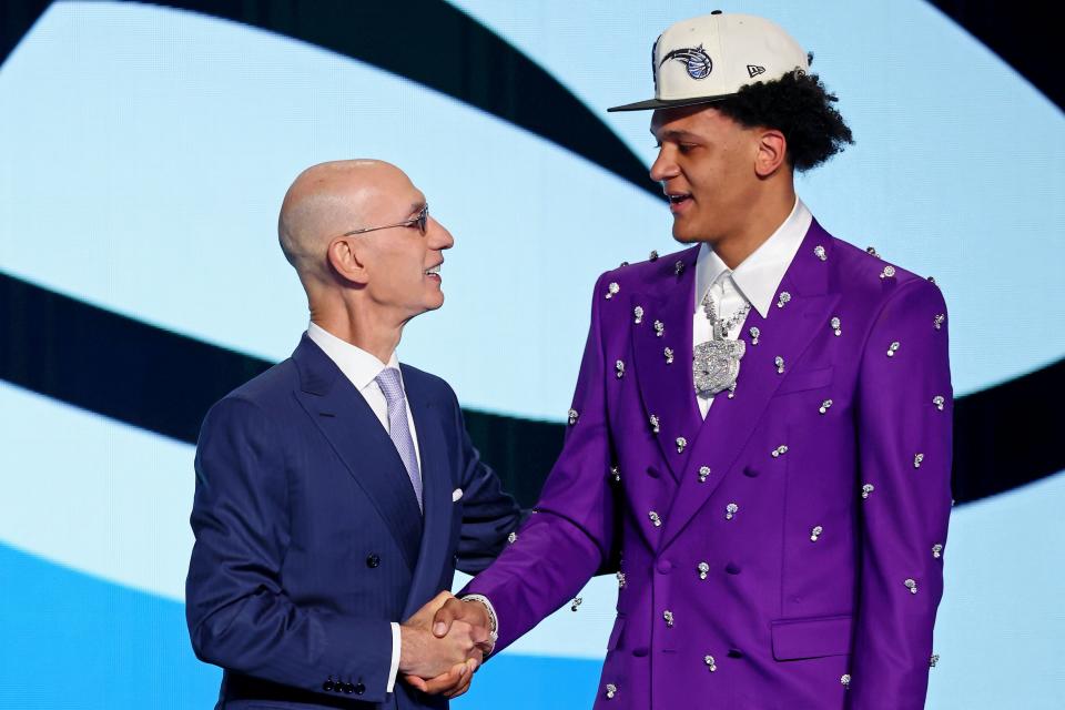 Jun 23, 2022; Brooklyn, NY, USA; Paolo Banchero (Duke) shakes hands with NBA commissioner Adam Silver after being selected as the number one overall pick by the Orlando Magic in the first round of the 2022 NBA Draft at Barclays Center. Mandatory Credit: Brad Penner-USA TODAY Sports