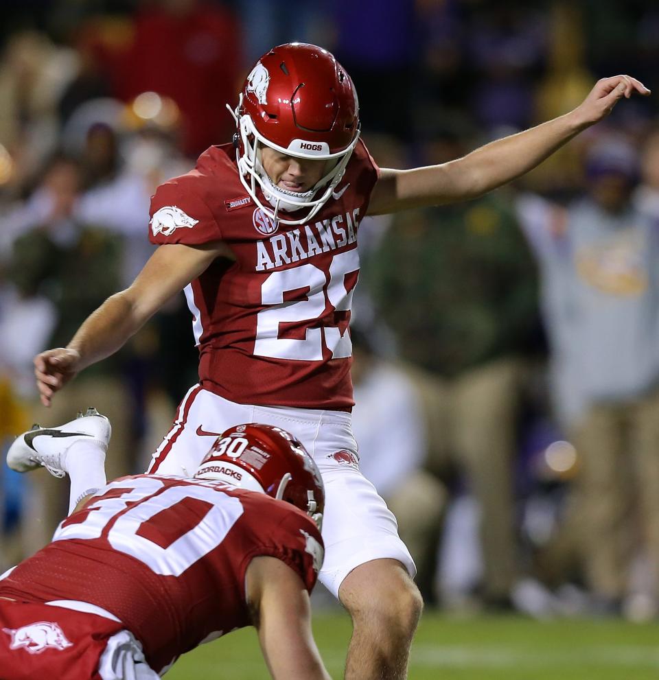 BATON ROUGE, LOUISIANA – NOVEMBER 13: Cam Little #29 of the Arkansas Razorbacks kicks the game winning field goal during overtime against the LSU Tigers at Tiger Stadium on November 13, 2021 in Baton Rouge, Louisiana. (Photo by Jonathan Bachman/Getty Images)