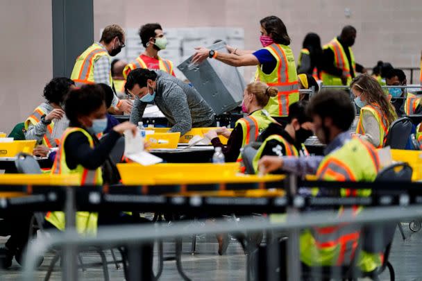 PHOTO: Philadelphia election workers process mail-in and absentee ballots for the general election, at the Pennsylvania Convention Center, Nov. 3, 2020, in Philadelphia. (Matt Slocum/AP, FILE)